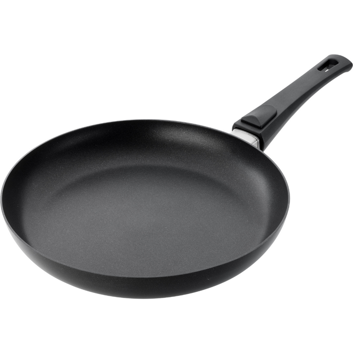 A black SCANPAN Urban 28cm Frying Pan with a smart detachable handle, suitable for modern kitchens.