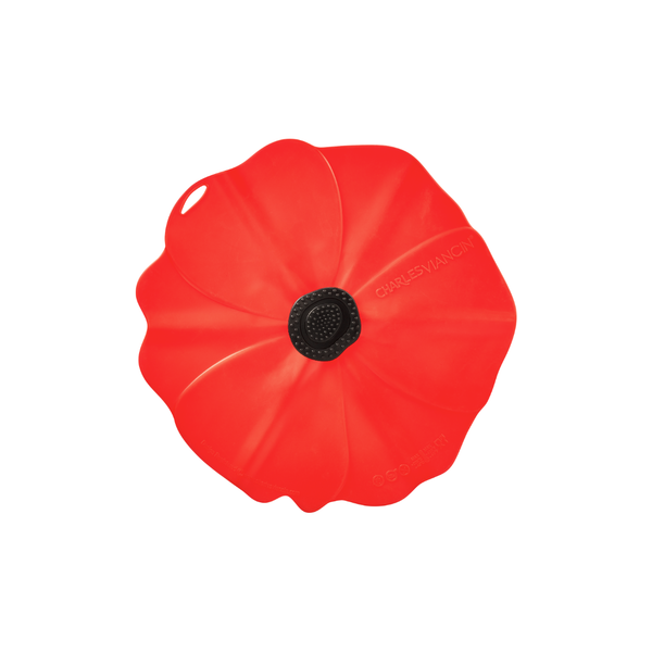 A red silicone poppy-shaped container with a black textured center, shown from a top-down view on a solid white background.