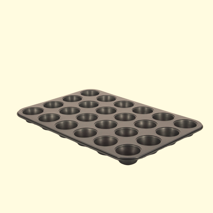 De Buyer 24 cup mini muffin tray showing side view on a white background