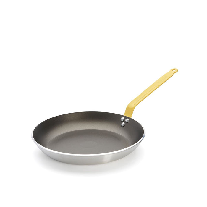 A De Buyer non-stick frying pan with a dark gray interior, a silver exterior, and a red handle, shown on a plain white background.
