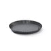 A dark gray fluted tart pan with a textured non-stick interior, shown on a clean white background.