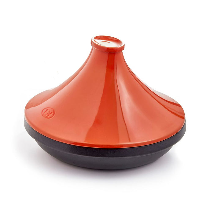 A glossy orange and black ceramic Moroccan tagine pot with a conical lid, shown on a clean white background.