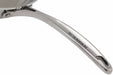 Close-up of a polished stainless steel pan handle with the brand name SCANPAN engraved on it, set against a plain white background.