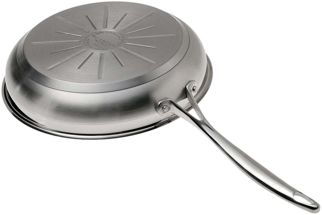 A stainless steel SCANPAN Impact frying pan shown from a high-angle perspective, displaying its brushed metal exterior, textured sunburst pattern on the bottom, and a long, polished handle on a solid white background.