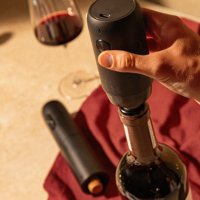 Vacu Vin Electric Wine Opener being used to open a wine bottle