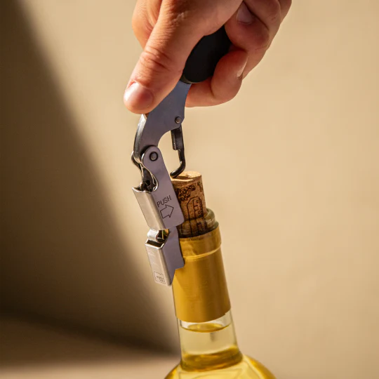 Vacu Vin Push Waiter's Corkscrew Large Black being used to open a wine bottle
