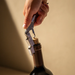 Vacu Vin Push Waiter's Corkscrew Wood being used to open a wine bottle