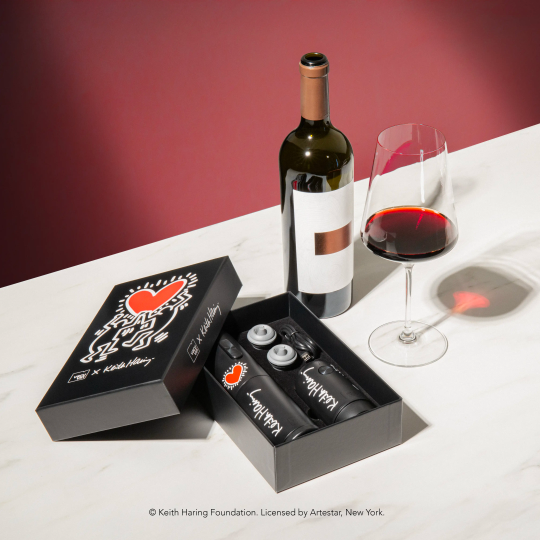 Vacu Vin x Keith Haring Wine Open & Save Set shown with wine bottle and accessories