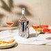 Vacu Vin Active Wine Cooler Silver wrapped around a wine bottle