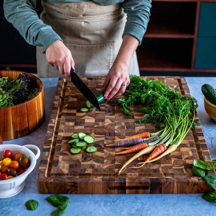 TeakHaus Butcher Block Chopping & Carving Board in use