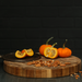 TeakHaus Butcher Block Round Serving & Cutting Board in use