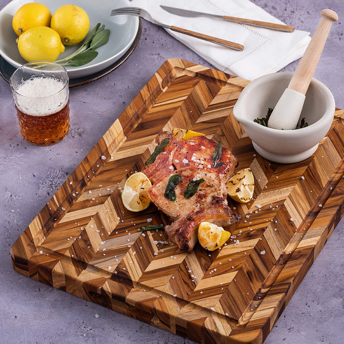 TeakHaus Herringbone Chopping Board Large in use